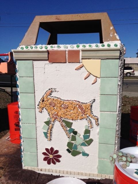 Goat grazing Trash can