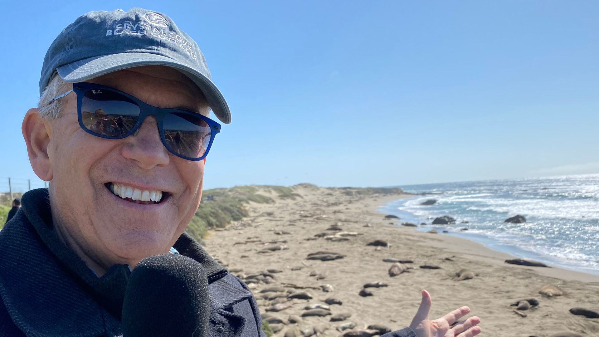 Host Pat Pattison at the beach