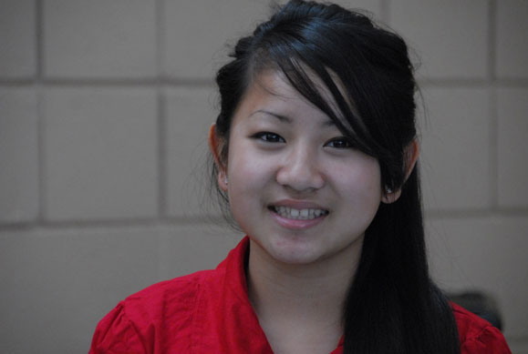 Young Asian Woman in Red Dress 